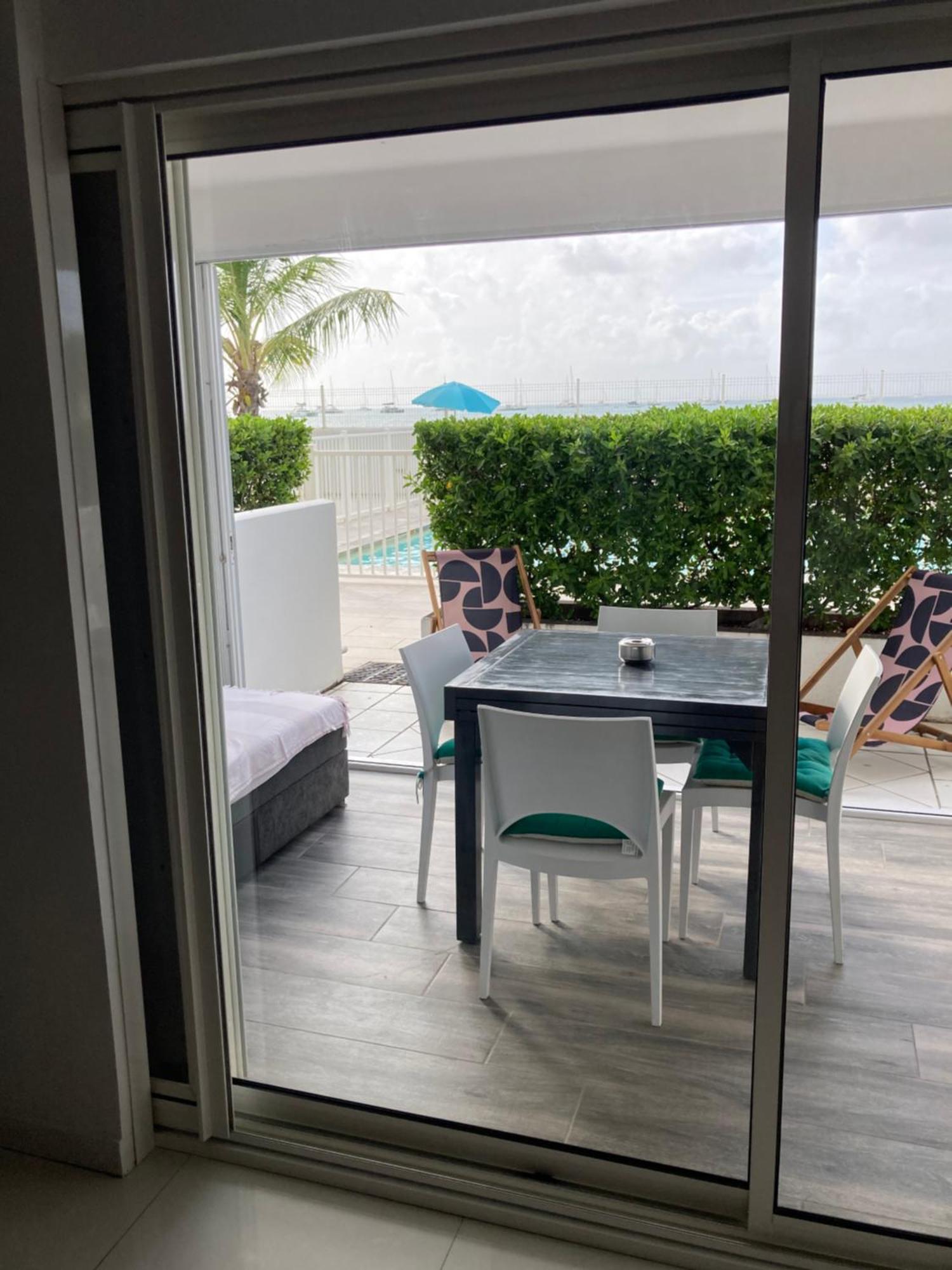 Appartement Pieds Dans L'Eau Vue Mer Acces Plage Et Piscine Marigot  Esterno foto